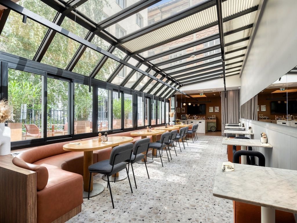 L'espace de coworking Wojo de l'Hôtel Mercure Paris 15, Porte de Versailles. L'espace de coworking Wojo de l'Hôtel Mercure Paris 15, Porte de Versailles.