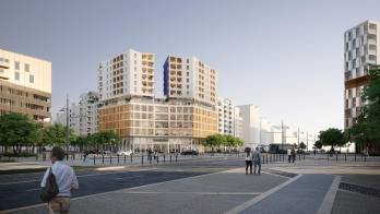 Le Prism à Montpellier, un immeuble de bureau surplombé d'un bloc résidentiel. © Kaufman & Broad